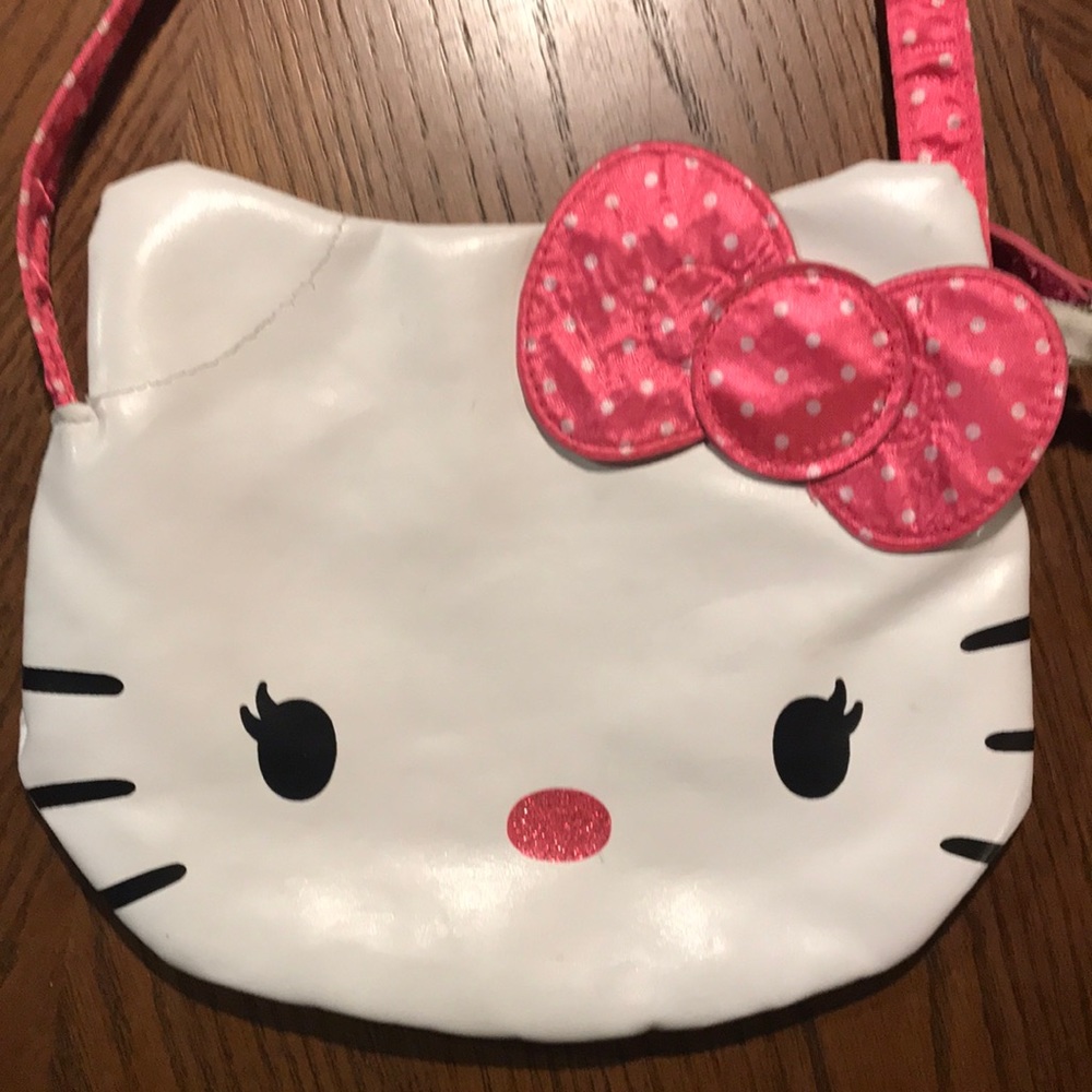 Sanrio Hello Kitty purse: satin pink with white polka dot strap and bow